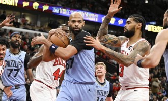 吉迪16+15+13考沃德17分 公牛大胜灰熊